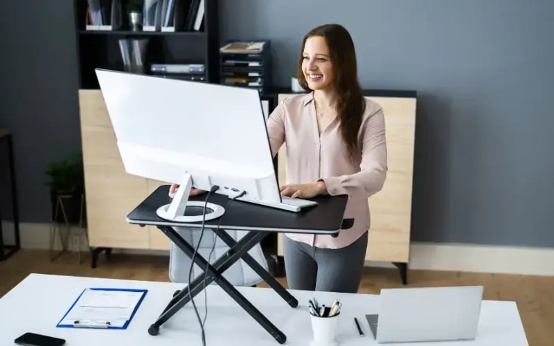 Adjustable Height Desk Stand In Office