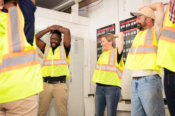 Employees doing stretching program