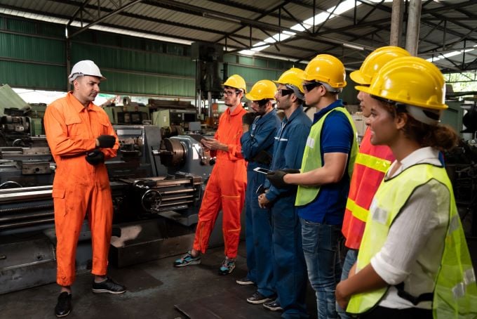 Employee meeting in an industrial warehouse