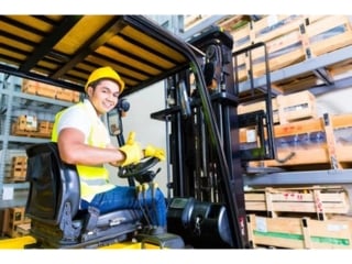 Employee on a forklift