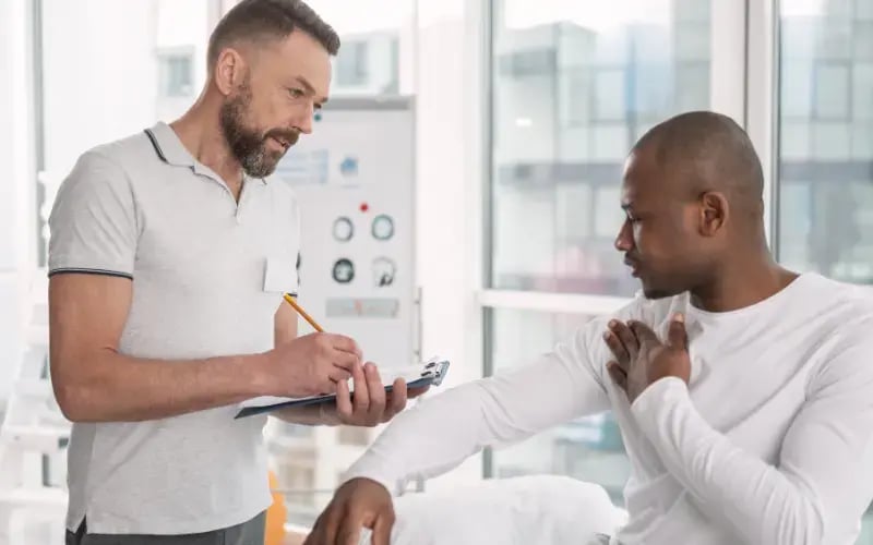 Employee with injured shoulder gets evaluated at onsite clinic