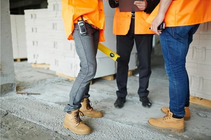 Low section shot of employees legs