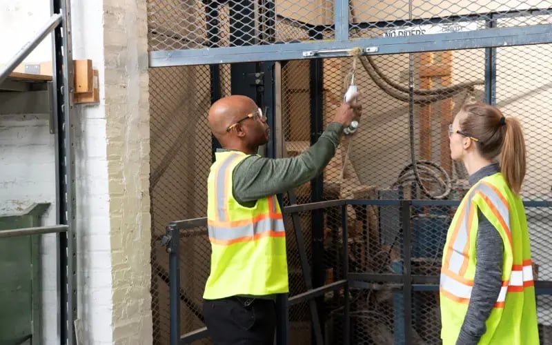 Man measuring how heavy a work task is