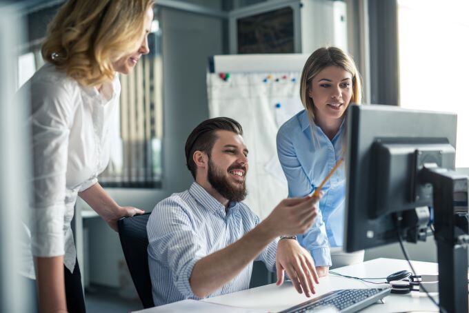 Office workers discussing