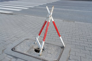 bigstock-Hole-In-Sidewalk-2725544.jpg