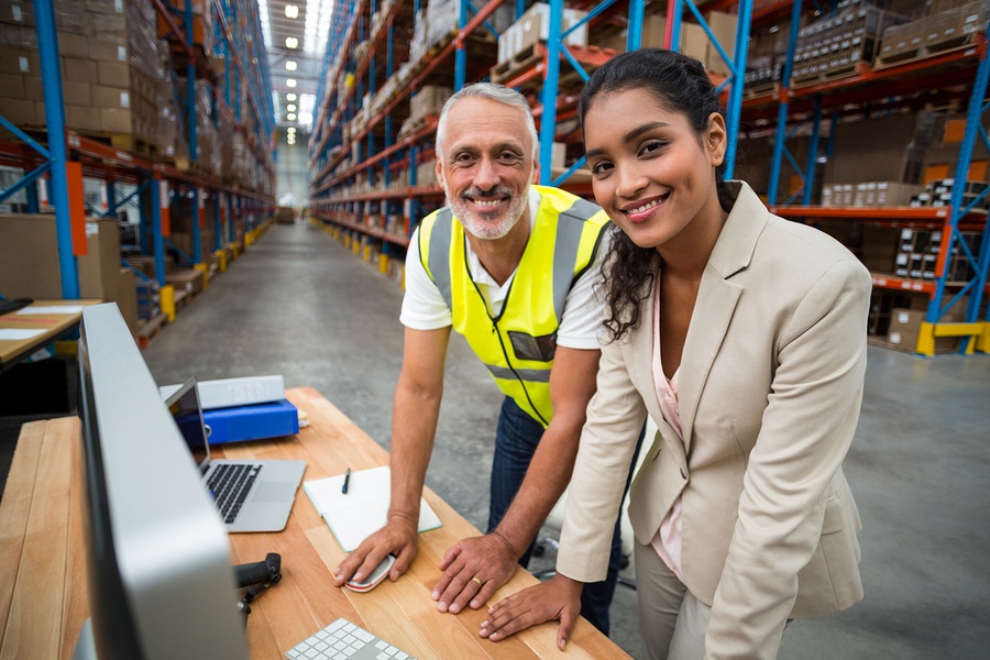 Warehouse manager meeting with team