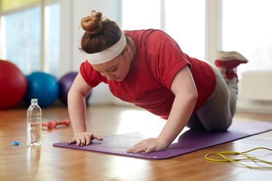 bigstock-Portrait-of-young-obese-woman--179064943