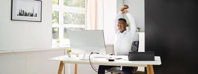 employee doing a stretch while sitting-1