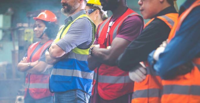 employees wearing their safety vests and gears