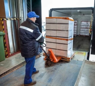 worker transferring boxes